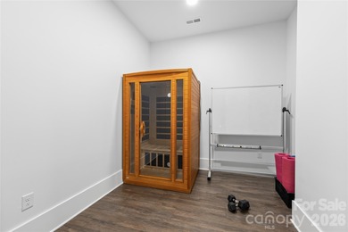 Experience modern elegance and breathtaking golf course views in on Verdict Ridge Golf and Country Club in North Carolina - for sale on GolfHomes.com, golf home, golf lot