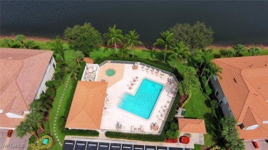 Step into this inviting and pristine first floor waterfront home on Colonial Country Club in Florida - for sale on GolfHomes.com, golf home, golf lot