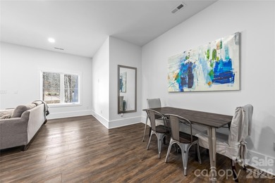 Experience modern elegance and breathtaking golf course views in on Verdict Ridge Golf and Country Club in North Carolina - for sale on GolfHomes.com, golf home, golf lot