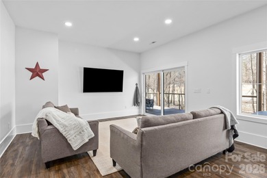 Experience modern elegance and breathtaking golf course views in on Verdict Ridge Golf and Country Club in North Carolina - for sale on GolfHomes.com, golf home, golf lot