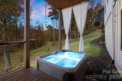 Experience modern elegance and breathtaking golf course views in on Verdict Ridge Golf and Country Club in North Carolina - for sale on GolfHomes.com, golf home, golf lot