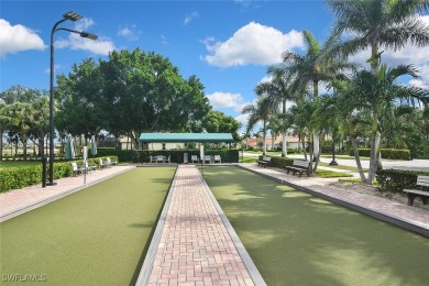 Step into this inviting and pristine first floor waterfront home on Colonial Country Club in Florida - for sale on GolfHomes.com, golf home, golf lot