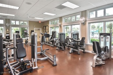 Step into this inviting and pristine first floor waterfront home on Colonial Country Club in Florida - for sale on GolfHomes.com, golf home, golf lot