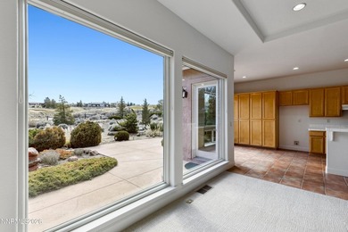 Behind the private gates of ArrowCreek, this thoughtfully on  in Nevada - for sale on GolfHomes.com, golf home, golf lot