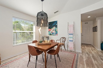 This home offers the perfect blend of modern boho charm and on Colonial Country Club in Florida - for sale on GolfHomes.com, golf home, golf lot