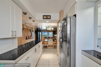 Move-in ready 2 bedroom condo in gated senior complex. Located on Inverrary Country Club in Florida - for sale on GolfHomes.com, golf home, golf lot