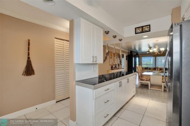 Move-in ready 2 bedroom condo in gated senior complex. Located on Inverrary Country Club in Florida - for sale on GolfHomes.com, golf home, golf lot