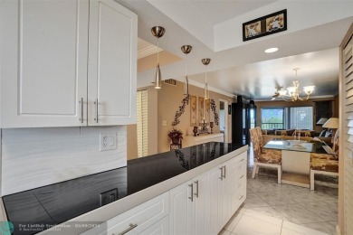 Move-in ready 2 bedroom condo in gated senior complex. Located on Inverrary Country Club in Florida - for sale on GolfHomes.com, golf home, golf lot