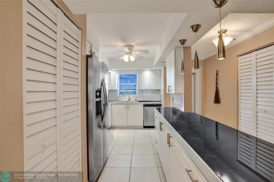 Move-in ready 2 bedroom condo in gated senior complex. Located on Inverrary Country Club in Florida - for sale on GolfHomes.com, golf home, golf lot