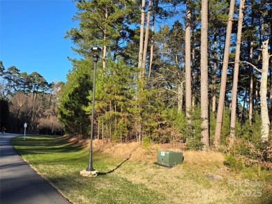 This Badin Lake area lot is located in the prestigious gated on Old North State Club at Uwharrie Point Golf community in North Carolina - for sale on GolfHomes.com, golf home, golf lot