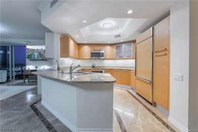 This stunning 3-bedroom condo boasts floor-to-ceiling panoramic on Las Vegas Country Club in Nevada - for sale on GolfHomes.com, golf home, golf lot