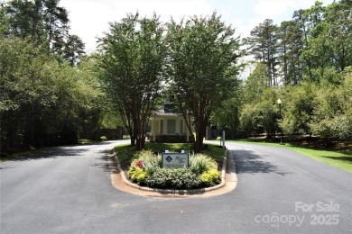 This Badin Lake area lot is located in the prestigious gated on Old North State Club at Uwharrie Point Golf community in North Carolina - for sale on GolfHomes.com, golf home, golf lot