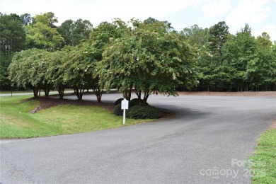 This Badin Lake area lot is located in the prestigious gated on Old North State Club at Uwharrie Point Golf community in North Carolina - for sale on GolfHomes.com, golf home, golf lot