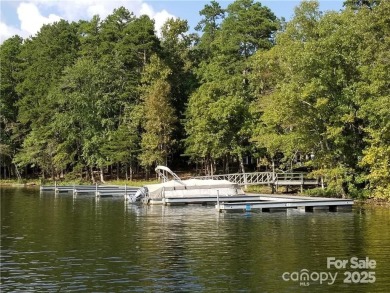 This Badin Lake area lot is located in the prestigious gated on Old North State Club at Uwharrie Point Golf community in North Carolina - for sale on GolfHomes.com, golf home, golf lot