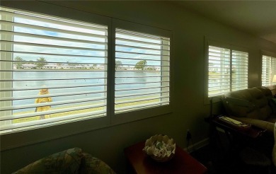 Beautiful waterview at this stunning 2 bedroom, 2 bath, 2 car on Mainlands Golf Club in Florida - for sale on GolfHomes.com, golf home, golf lot