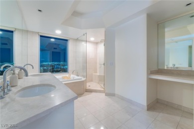 This stunning 3-bedroom condo boasts floor-to-ceiling panoramic on Las Vegas Country Club in Nevada - for sale on GolfHomes.com, golf home, golf lot