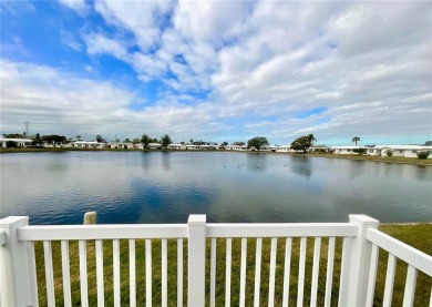 Beautiful waterview at this stunning 2 bedroom, 2 bath, 2 car on Mainlands Golf Club in Florida - for sale on GolfHomes.com, golf home, golf lot