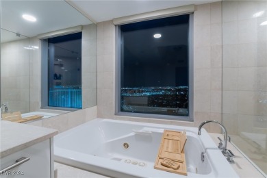 This stunning 3-bedroom condo boasts floor-to-ceiling panoramic on Las Vegas Country Club in Nevada - for sale on GolfHomes.com, golf home, golf lot