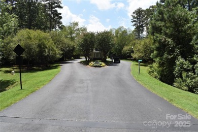 This Badin Lake area lot is located in the prestigious gated on Old North State Club at Uwharrie Point Golf community in North Carolina - for sale on GolfHomes.com, golf home, golf lot