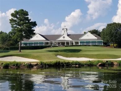 This Badin Lake area lot is located in the prestigious gated on Old North State Club at Uwharrie Point Golf community in North Carolina - for sale on GolfHomes.com, golf home, golf lot