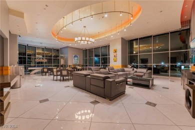 This stunning 3-bedroom condo boasts floor-to-ceiling panoramic on Las Vegas Country Club in Nevada - for sale on GolfHomes.com, golf home, golf lot