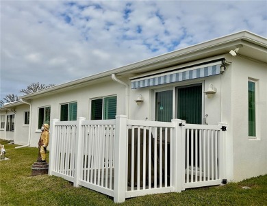 Beautiful waterview at this stunning 2 bedroom, 2 bath, 2 car on Mainlands Golf Club in Florida - for sale on GolfHomes.com, golf home, golf lot