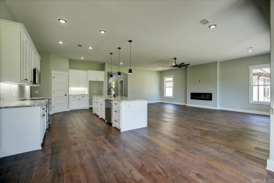 Beautiful new construction home on Granada Golf Course.  Many on Granada Golf Course in Arkansas - for sale on GolfHomes.com, golf home, golf lot