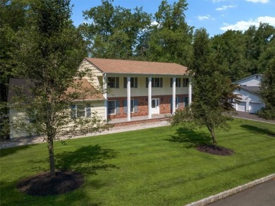 Welcome to this stunning center-hall colonial. This home on Dellwood Country Club in New York - for sale on GolfHomes.com, golf home, golf lot