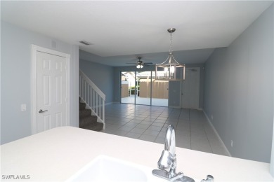 Welcome to this beautifully appointed 4-bedroom, 3-bath townhome on Palmira Golf and Country Club in Florida - for sale on GolfHomes.com, golf home, golf lot
