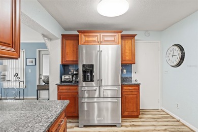 Located in Mainlands of Tamarac by the Gulf, this updated on Mainlands Golf Club in Florida - for sale on GolfHomes.com, golf home, golf lot