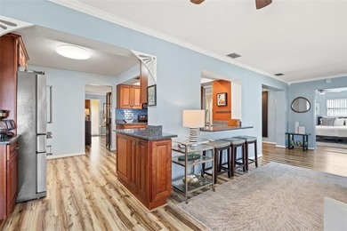 Located in Mainlands of Tamarac by the Gulf, this updated on Mainlands Golf Club in Florida - for sale on GolfHomes.com, golf home, golf lot