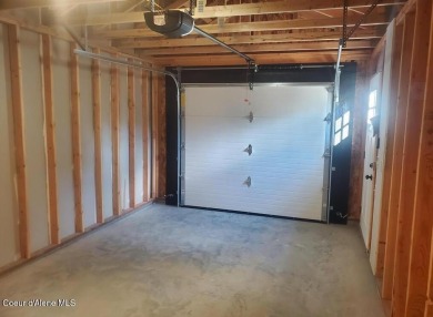 Charming 2-bedroom, 2-bath cottage nestled in a peaceful on Sandpoint Elks Golf Course in Idaho - for sale on GolfHomes.com, golf home, golf lot
