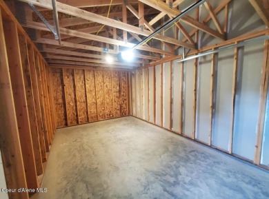Charming 2-bedroom, 2-bath cottage nestled in a peaceful on Sandpoint Elks Golf Course in Idaho - for sale on GolfHomes.com, golf home, golf lot