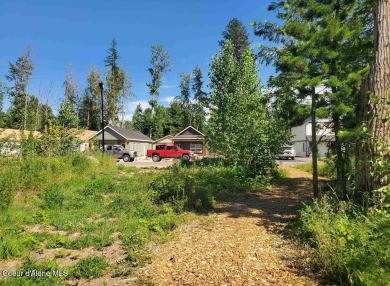 Charming 2-bedroom, 2-bath cottage nestled in a peaceful on Sandpoint Elks Golf Course in Idaho - for sale on GolfHomes.com, golf home, golf lot