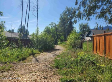 Charming 2-bedroom, 2-bath cottage nestled in a peaceful on Sandpoint Elks Golf Course in Idaho - for sale on GolfHomes.com, golf home, golf lot