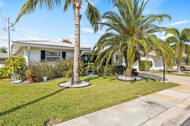 Located in Mainlands of Tamarac by the Gulf, this updated on Mainlands Golf Club in Florida - for sale on GolfHomes.com, golf home, golf lot