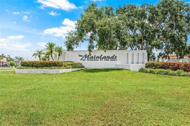 Located in Mainlands of Tamarac by the Gulf, this updated on Mainlands Golf Club in Florida - for sale on GolfHomes.com, golf home, golf lot