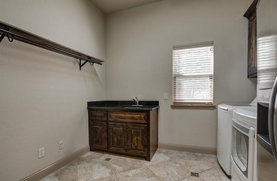 Welcome to your private waterfront retreat in the heart of on Woodbridge Golf Club in Texas - for sale on GolfHomes.com, golf home, golf lot