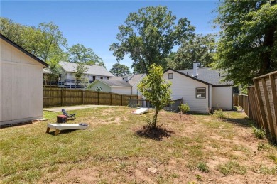 Welcome to 376 Hooper Street, a charming bungalow known for its on East Lake Golf Club in Georgia - for sale on GolfHomes.com, golf home, golf lot