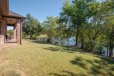 Welcome to your private waterfront retreat in the heart of on Woodbridge Golf Club in Texas - for sale on GolfHomes.com, golf home, golf lot