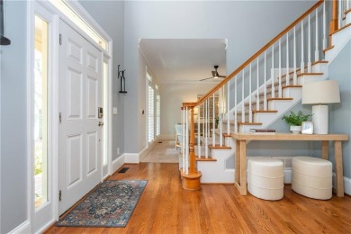 Welcome to Windward! From the inviting front porch, perfect for on The Golf Club of Georgia in Georgia - for sale on GolfHomes.com, golf home, golf lot