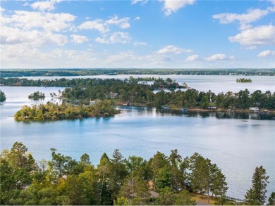 Experience the best of maintenance-free lake living year-round on Whitefish Golf Club in Minnesota - for sale on GolfHomes.com, golf home, golf lot