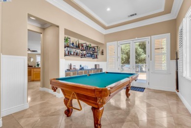 Discover refined living in this stunning 5-bedroom, 4.5-bath on Shadow Lakes Golf Club in California - for sale on GolfHomes.com, golf home, golf lot