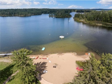 Experience the best of maintenance-free lake living year-round on Whitefish Golf Club in Minnesota - for sale on GolfHomes.com, golf home, golf lot