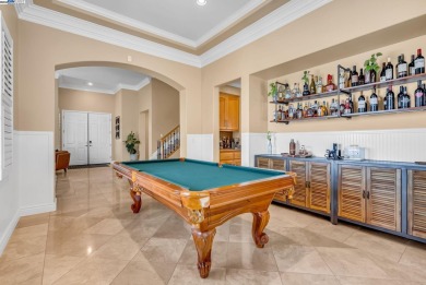 Discover refined living in this stunning 5-bedroom, 4.5-bath on Shadow Lakes Golf Club in California - for sale on GolfHomes.com, golf home, golf lot