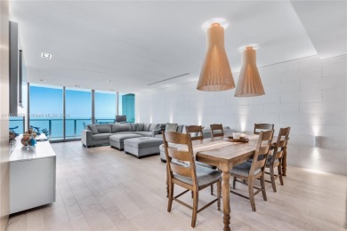 Gorgeous finely finished flow-through unit at the exclusive on Crandon Golf At Key Biscayne in Florida - for sale on GolfHomes.com, golf home, golf lot