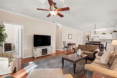 This first-floor end unit condominium features three bedrooms on Barefoot Resort and Golf Club  in South Carolina - for sale on GolfHomes.com, golf home, golf lot