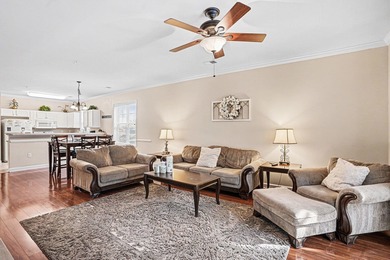 This first-floor end unit condominium features three bedrooms on Barefoot Resort and Golf Club  in South Carolina - for sale on GolfHomes.com, golf home, golf lot