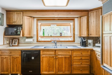 Set on a beautifully landscaped 3.67-acre lot surrounded by on Highland Links Golf Course in Massachusetts - for sale on GolfHomes.com, golf home, golf lot
