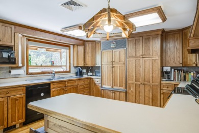 Set on a beautifully landscaped 3.67-acre lot surrounded by on Highland Links Golf Course in Massachusetts - for sale on GolfHomes.com, golf home, golf lot